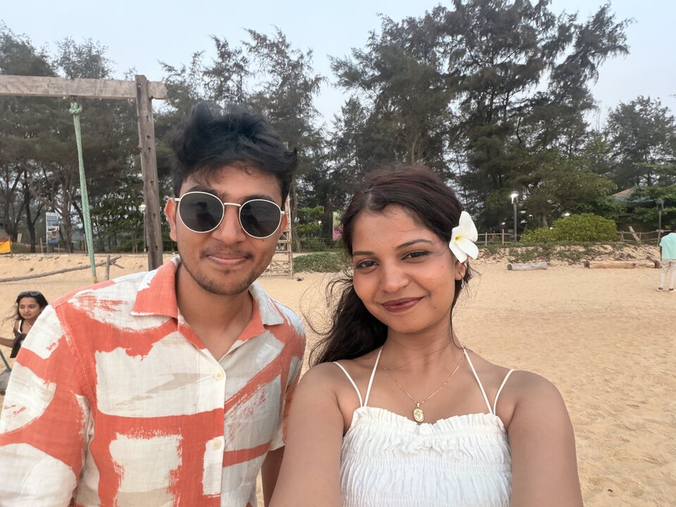 Close couple selfie on a sunny beach.